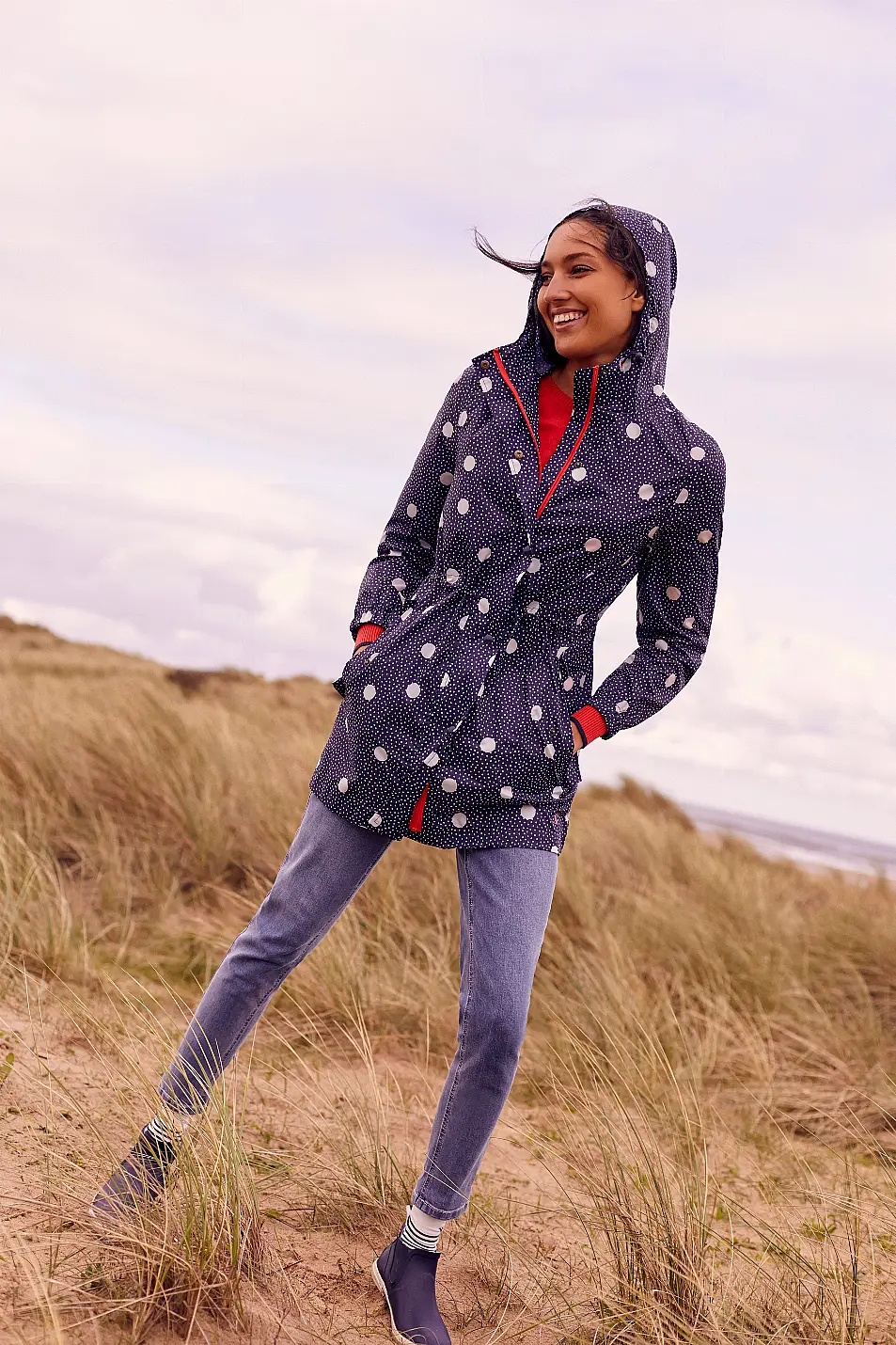 model wearing Joules Blue Rainwell Short Slip On Wellies