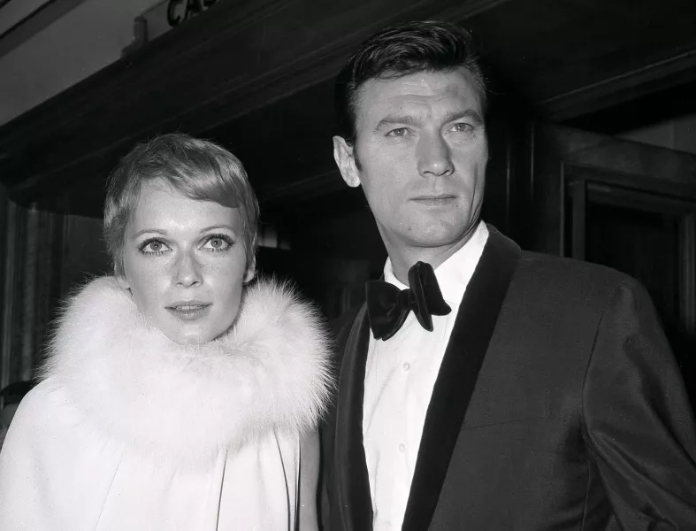 Mia Farrow and Laurence Harvey in 1967