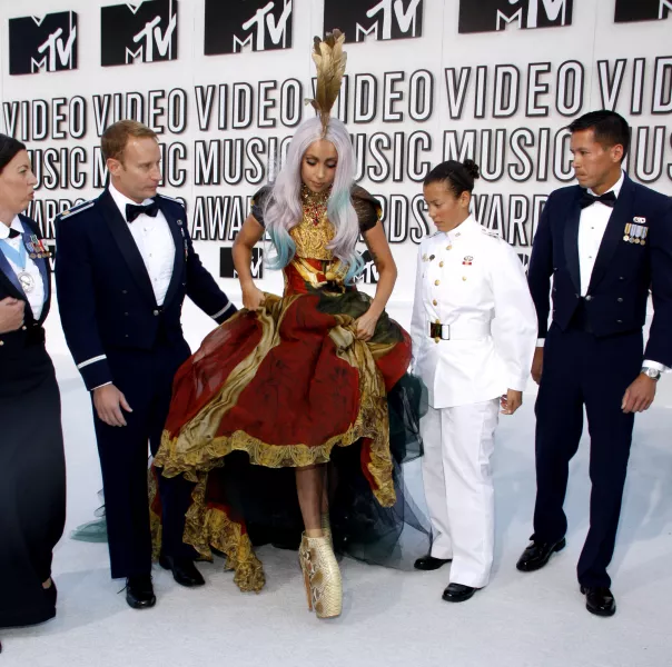 Lady Gaga wearing Alexander McQueen's armadillo boots to the 2010 MTV VMAs 