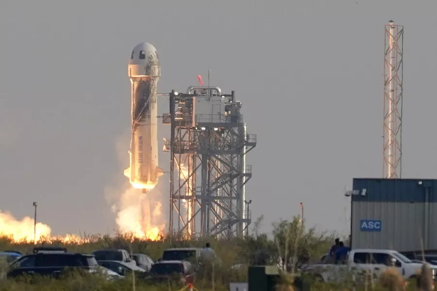 Blue Origin's New Shepard rocket blasts off