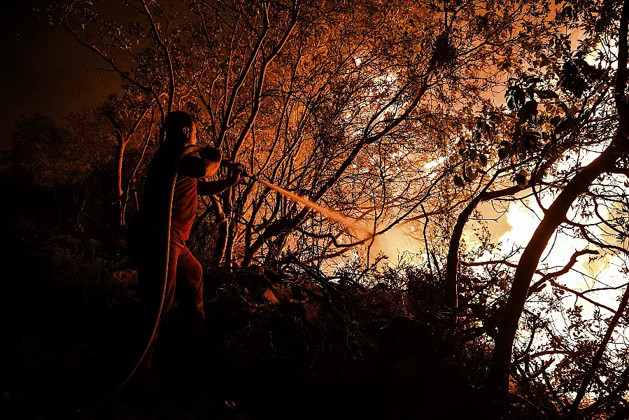 A firefighter in Kirli village in Antalya province 