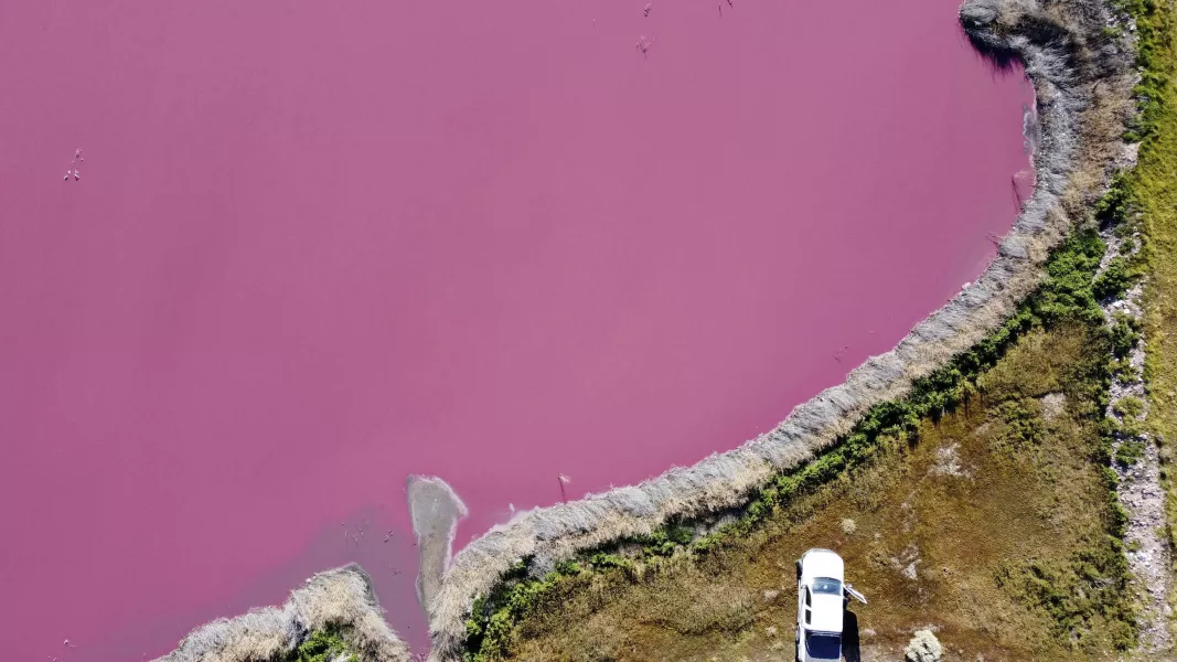 An aerial view of Corfo lagoon, which has turned a striking shade of pink as a result of what local environmentalists are attributing to increased pollution from a nearby industrial park, in Trelew, Chubut province, Argentina