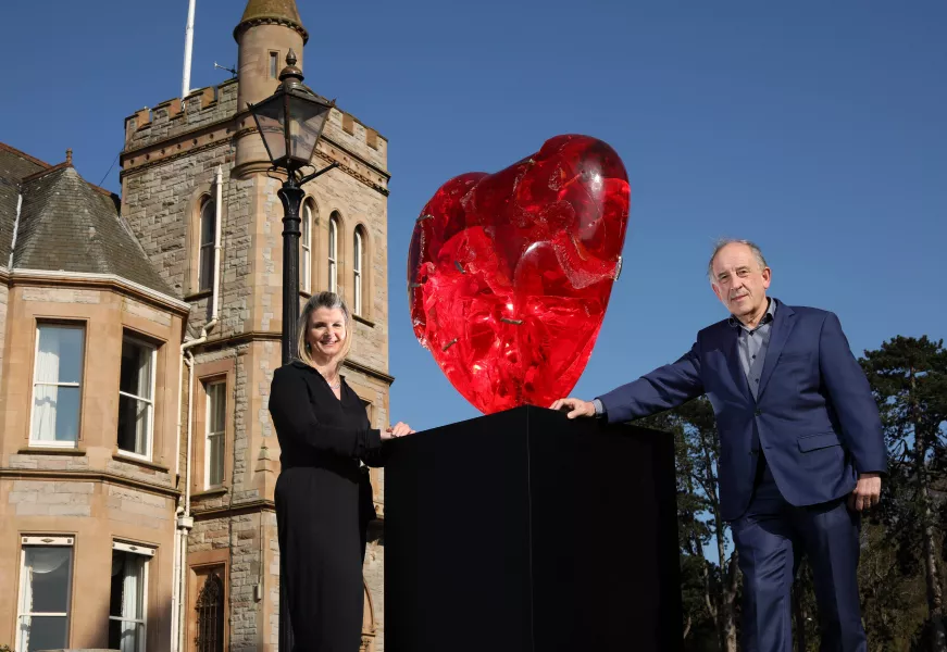 Lisa Steele, general manager of The Culloden Hotel and Oliver Gormley of Gormleys Fine Art, pictured with Broken Heart by Patrick O’Reilly