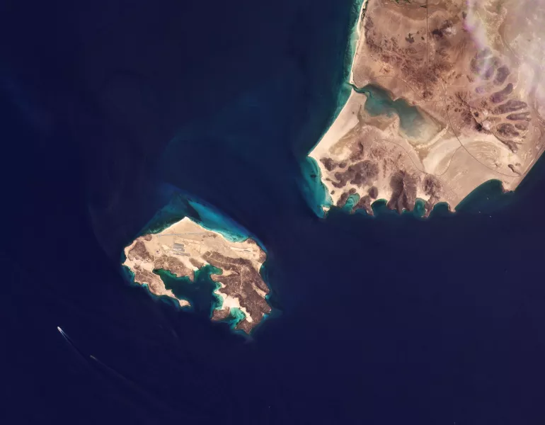 Yemen's Mayun Island in the Bab el-Mandeb Strait and mainland Yemen are seen in this May 8, 2021 satellite photograph from Planet Labs Inc.