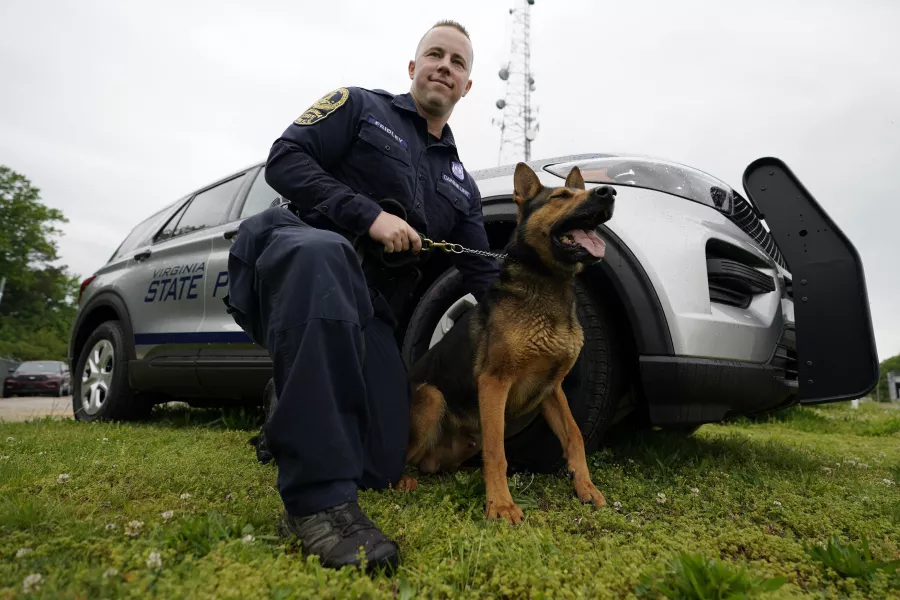 A police officer and his dog
