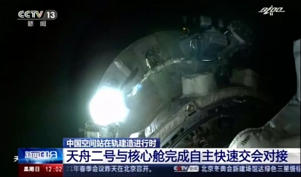 Tianhe core module's camera footage showing Tianzhou 2 cargo spacecraft approaching