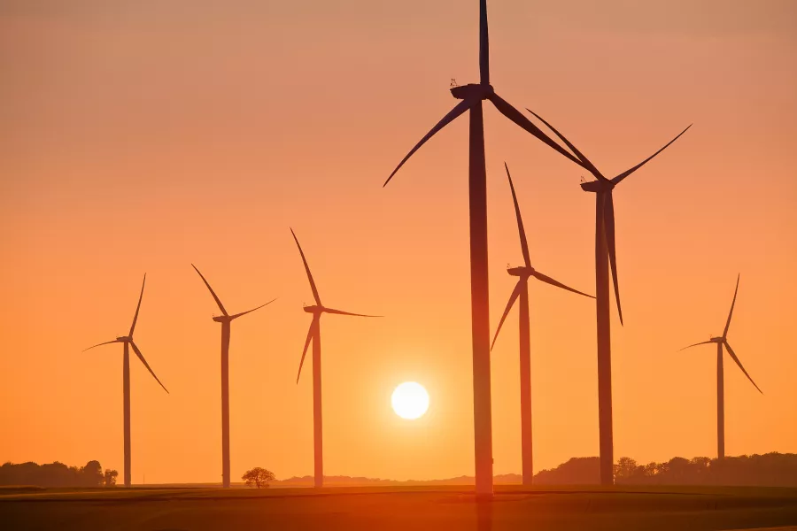 Wind turbines at sunset