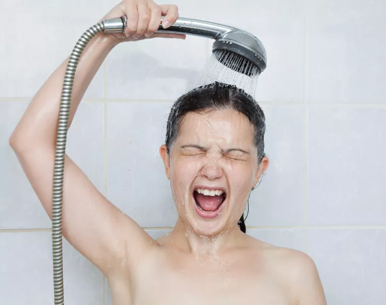 woman in a cold shower