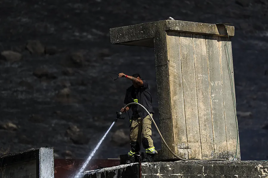 An Israeli firefighter