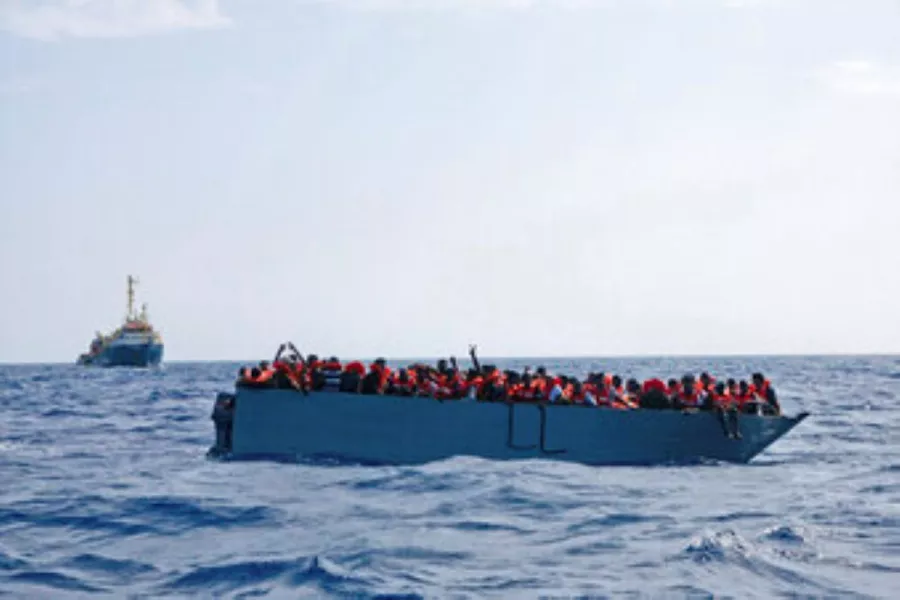 A vessel carrying migrants (Sea-Watchdog/AP)