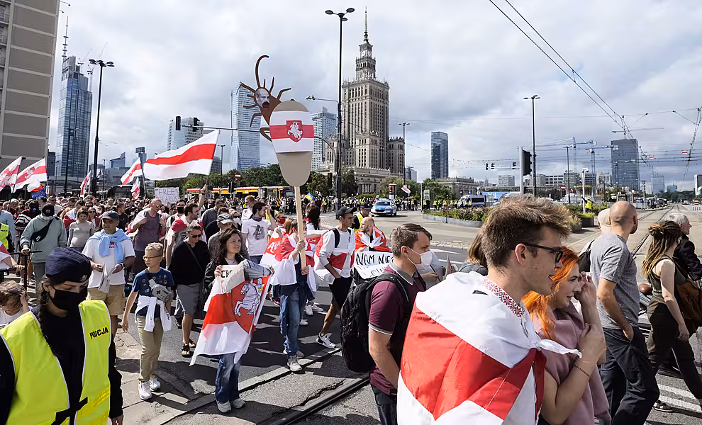 People denounce the regime of Belarusian President Alexander Lukashenko in Warsaw, Poland 