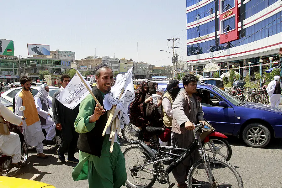 A man sells Taliban flags in Herat province, west of Kabul, Afghanistan 