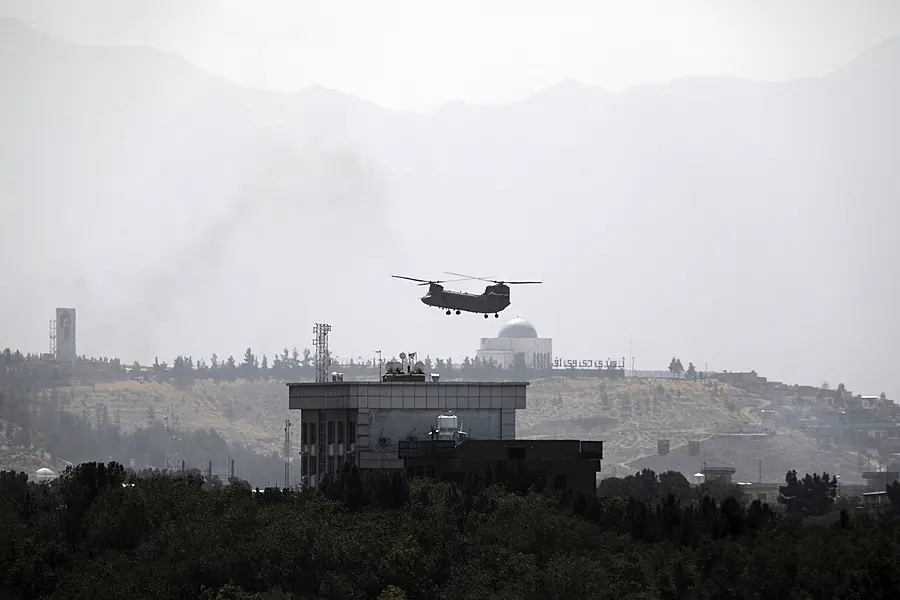 A US Chinook helicopter flies over the US embassy in Kabul, Afghanistan