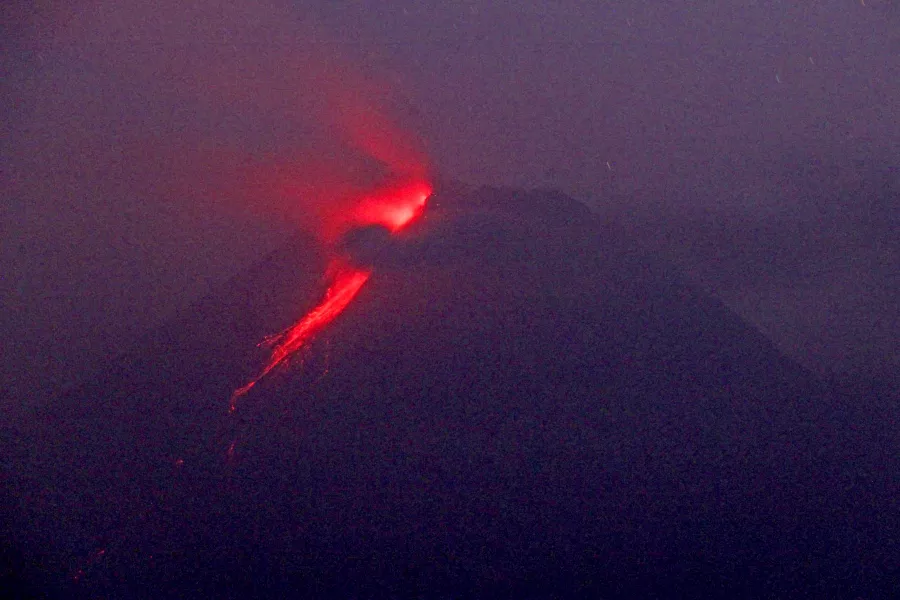 Hot lava runs down from the crater of Mount Merapi in Sleman, Yogyakarta, Indonesia