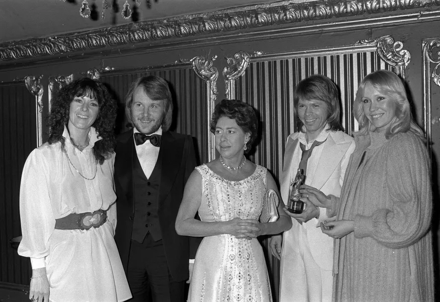 Princess Margaret with four members of the Swedish pop group "Abba"
