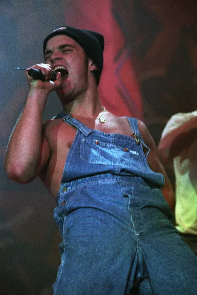 Robbie Williams performing with Take That in 1992