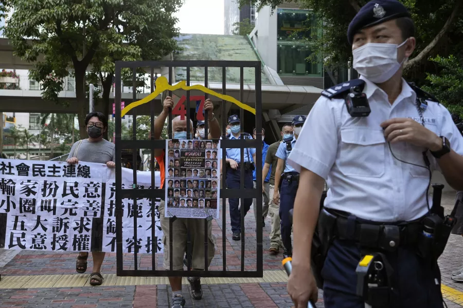 A police officer guards at a street during a protest against the vote 