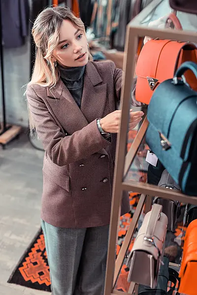 Woman browsing in a clothes shop