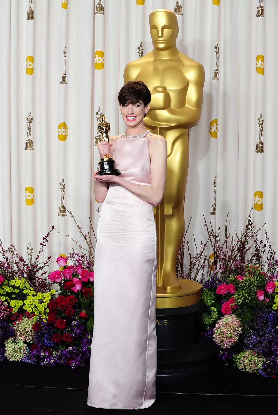 Anne Hathaway with her Oscar for best supporting actress received for her role in Les Miserables during the 85th Academy Awards