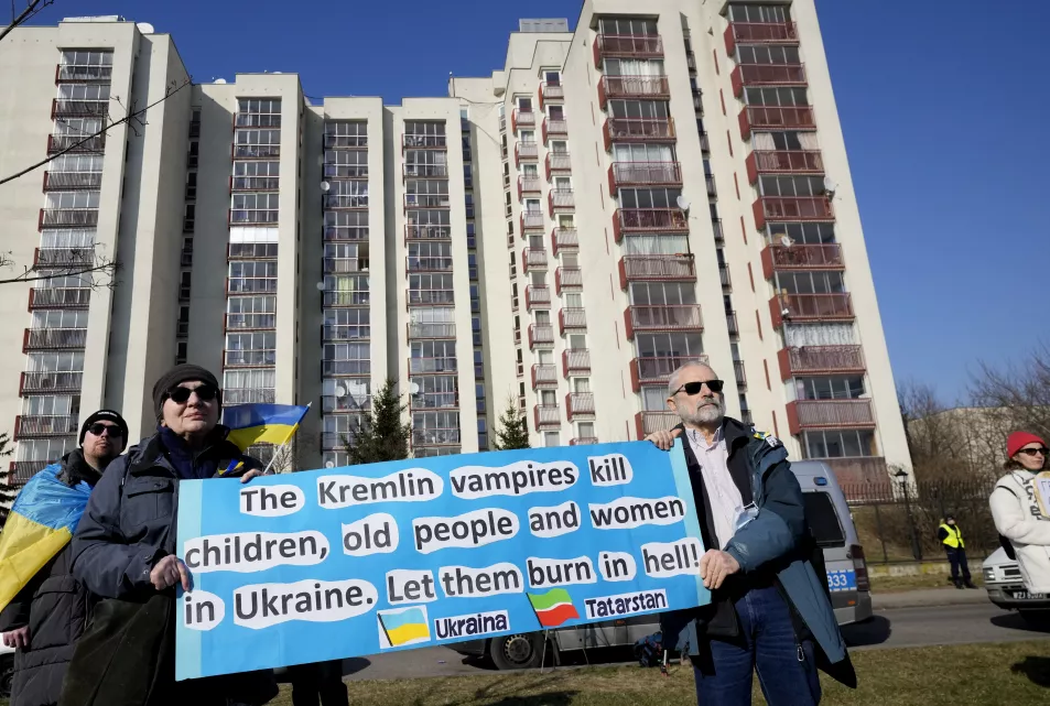 Two protesters demonstrate in Warsaw 