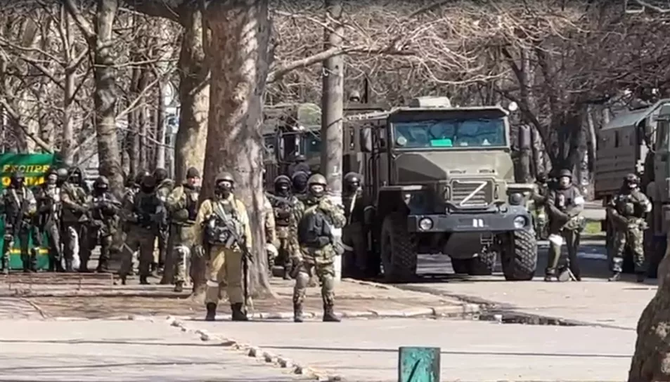 Russian soldiers at the protest in Kherson