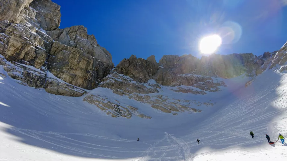 Scientists walk on the slopes of the Mt Gran Sasso d'Italia, in central Italy