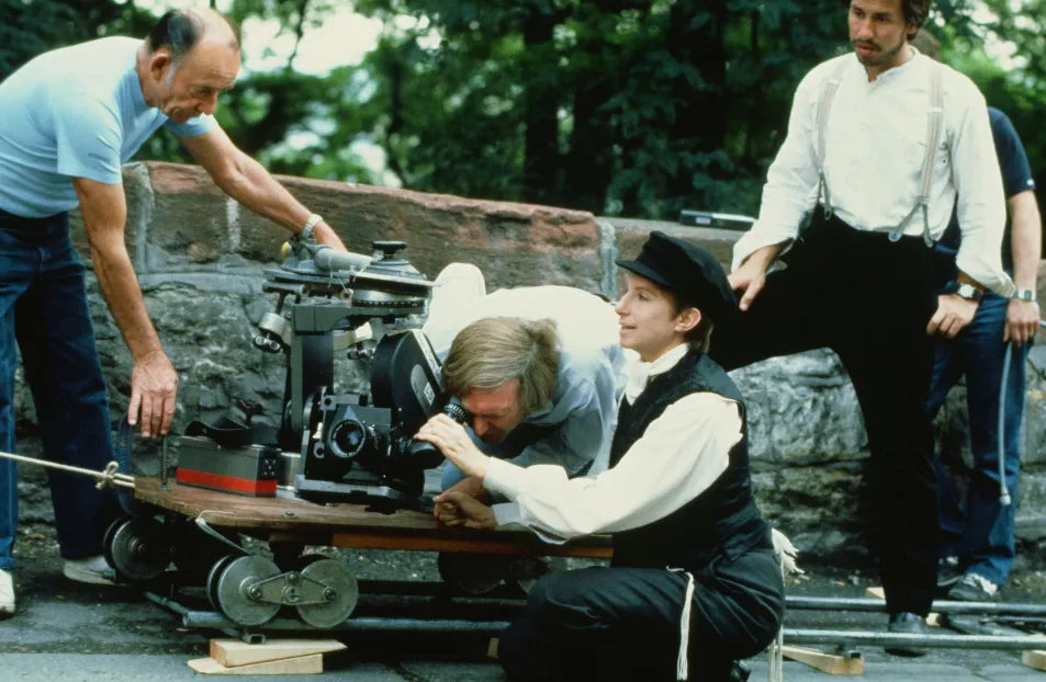 Barbra Streisand on set during the filming of Yentl, 1983