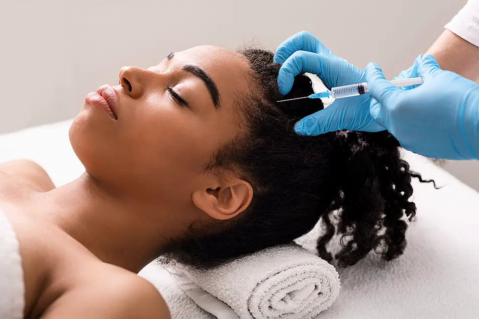 Woman getting steroid injections for alopecia