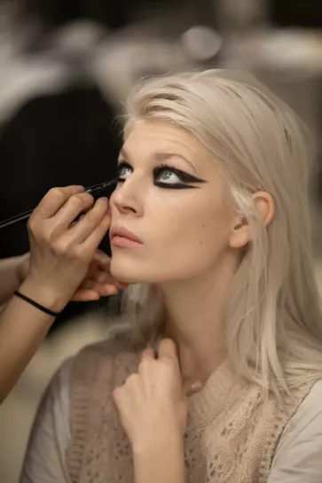  model backstage at Chanel SS22 catwalk show
