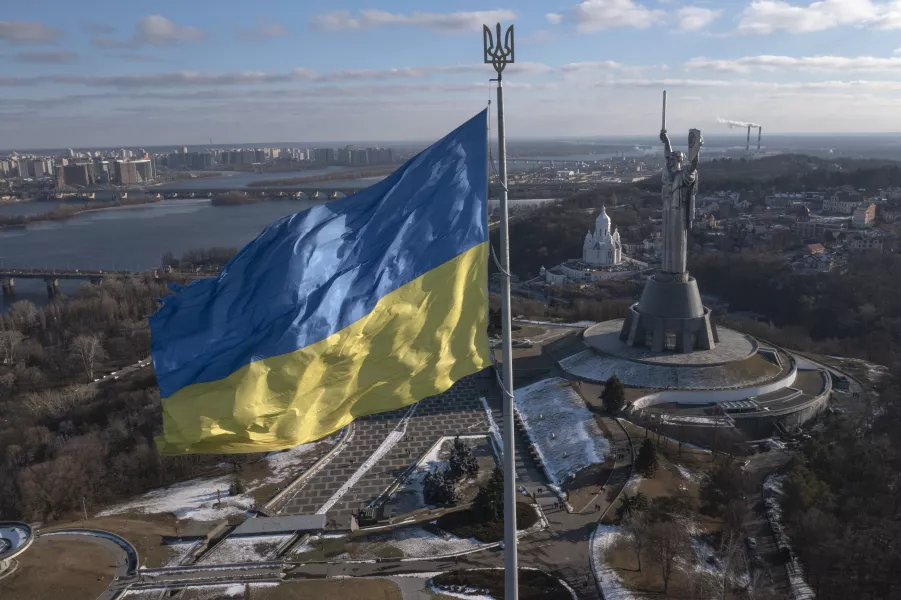 A view of Ukraine's national flag flying above Kyiv 
