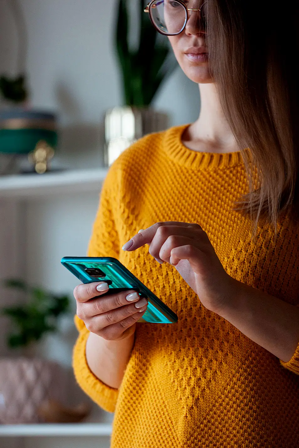 Woman holding mobile phone