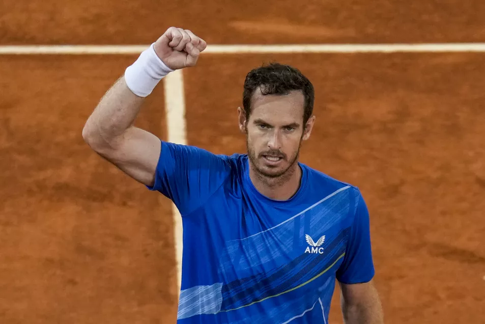Andy Murray, of Britain, celebrates his victory over Dominic Thiem of Austria during their match at the Mutua Madrid Open tennis tournament in Madrid, Spain, Monday, May 2, 2022