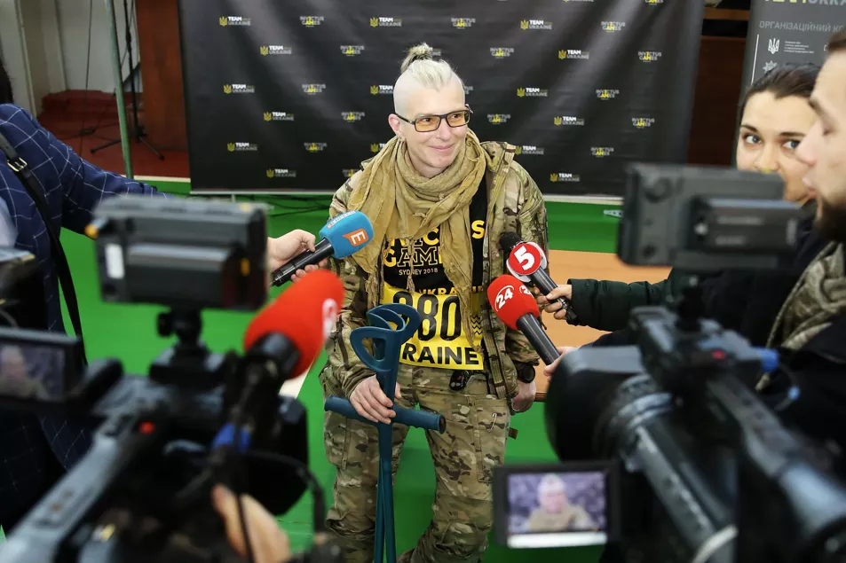 In this 2018 photo provided by the Invictus Games Team Ukraine, Yuliia Paievska, known as Taira, speaks to the media during trials in Kyiv