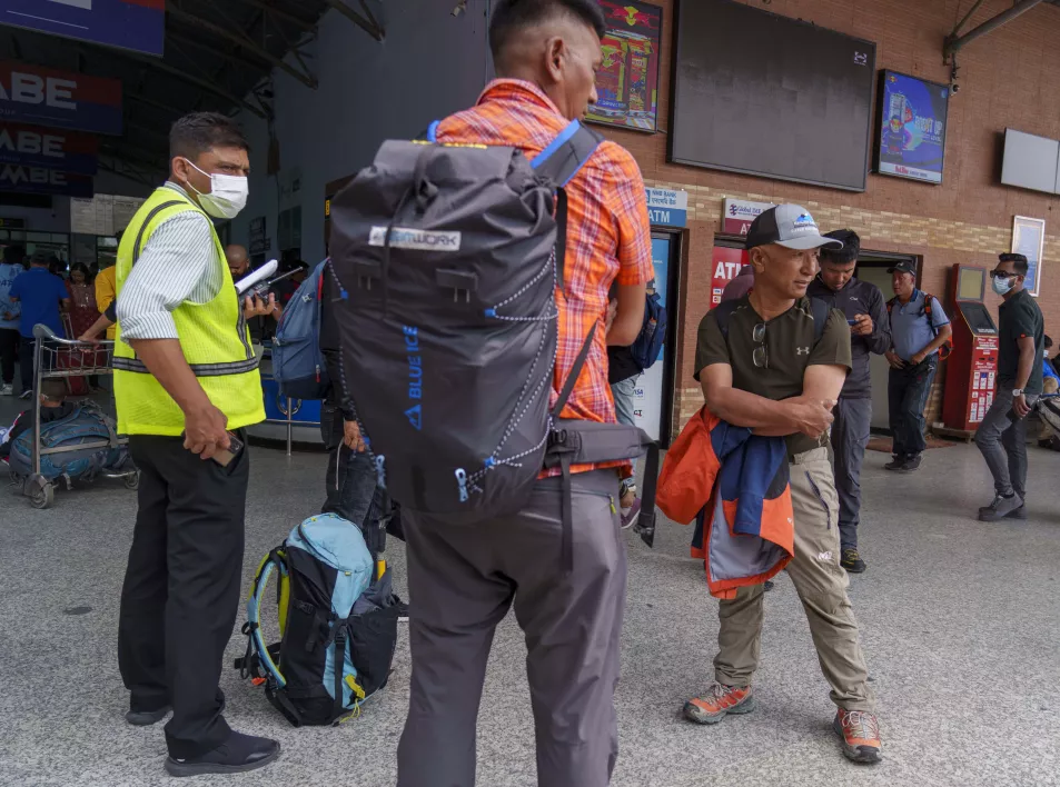 A team of climbers prepare to leave for rescue operations from the Tribhuvan International Airport in Kathmandu, Nepal, on Sunday, May 29, 2022