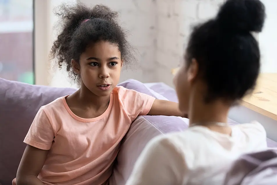 Mother and daughter having an open conversation