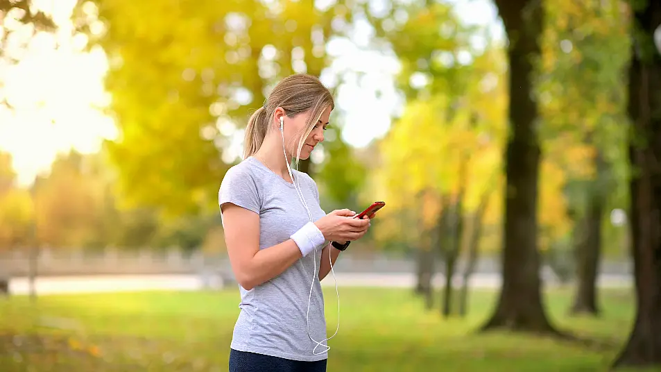 Woman in running gear in the park