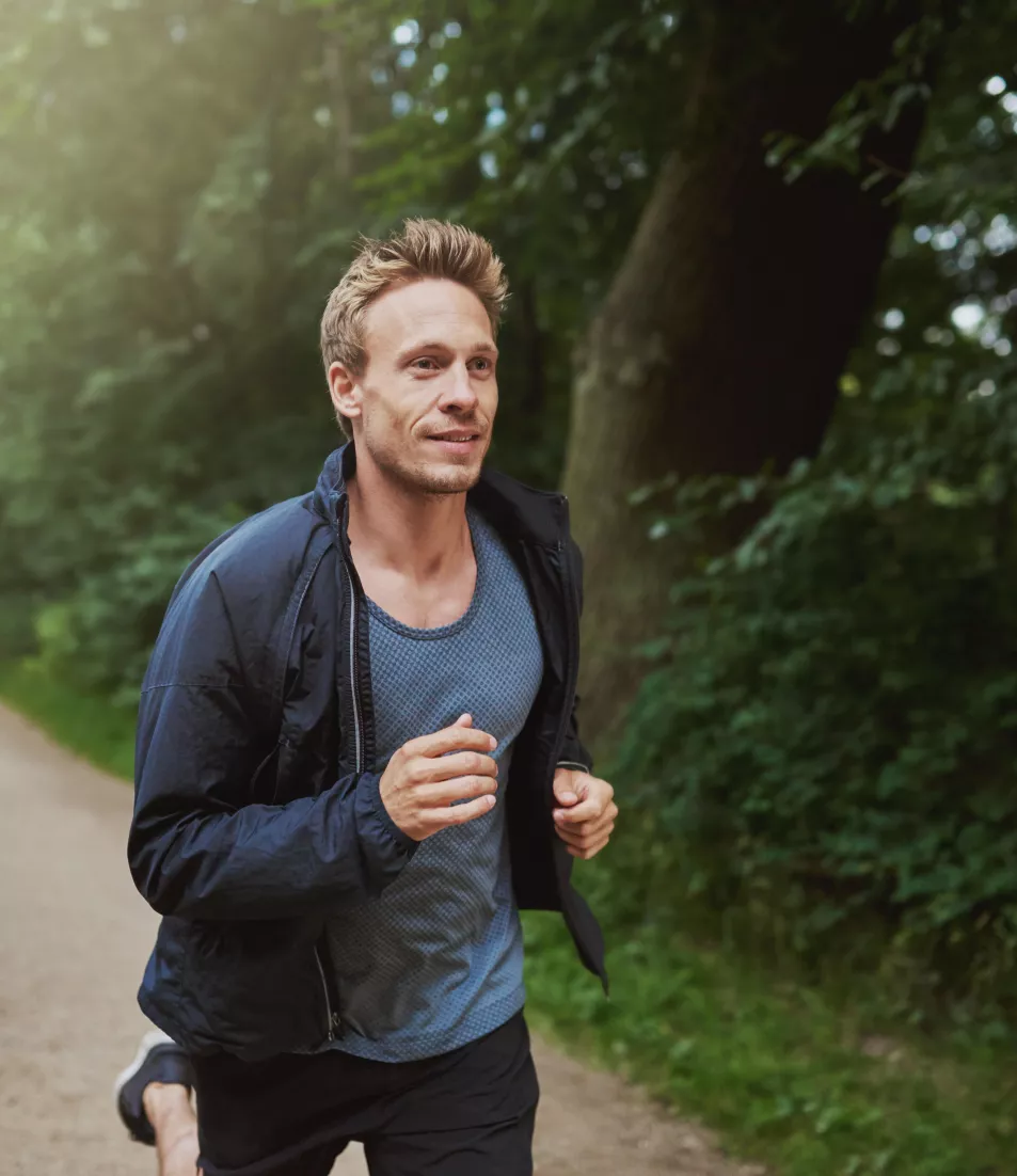 Man running in the shade