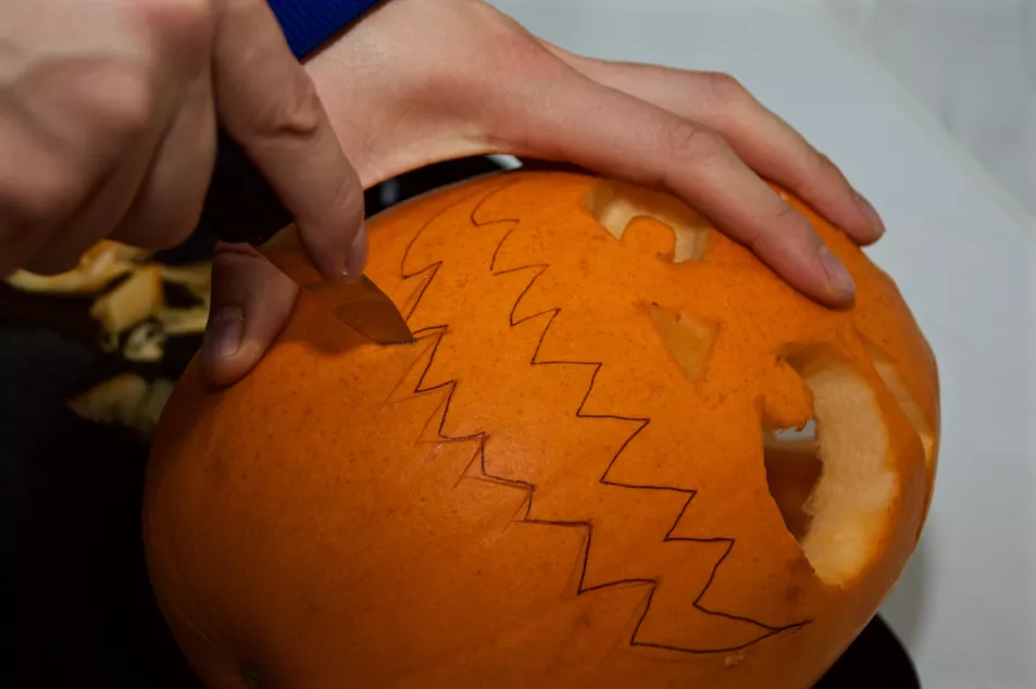 pumpkin being carved