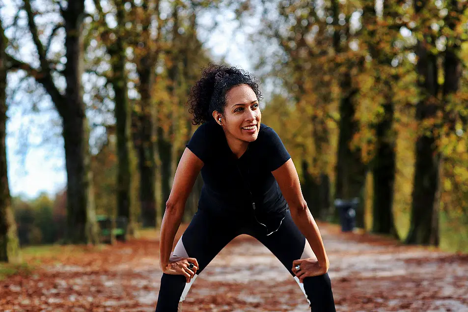 Black woman in a park after a run