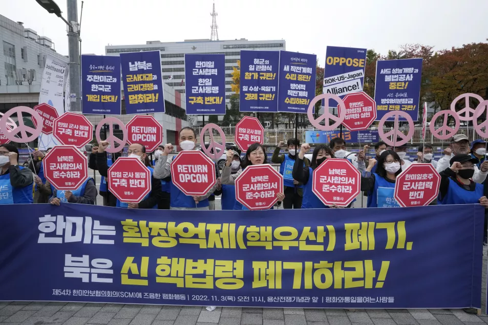 Protesters stage a rally to demand peace on the Korean peninsula in front of the presidential office in Seoul 