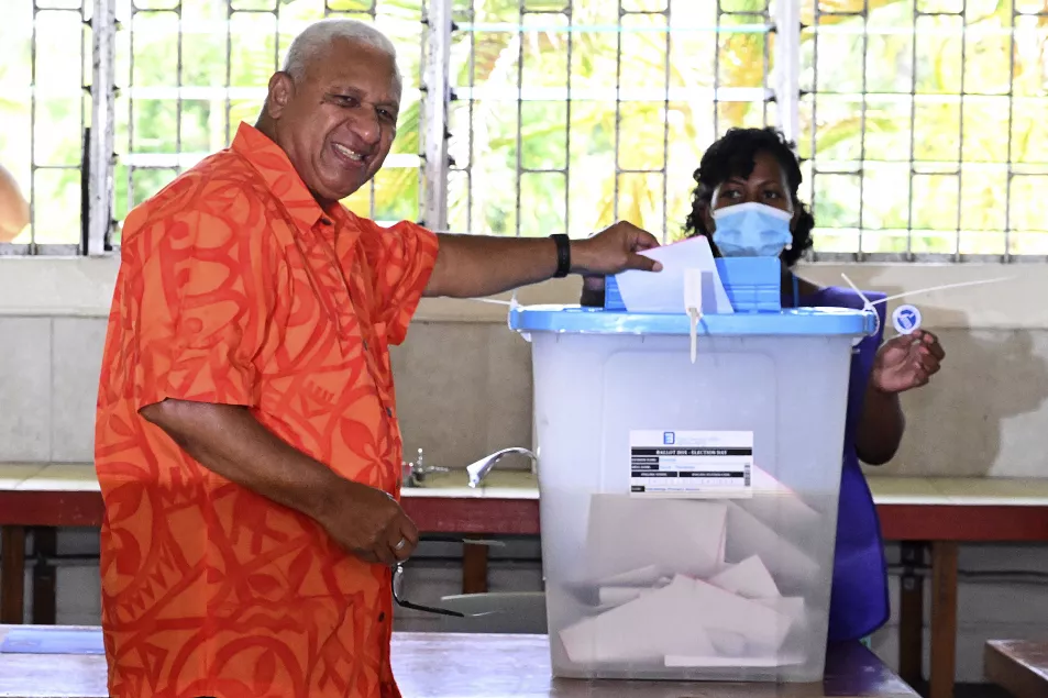 Fiji's Prime Minister and FijiFirst leader Frank Bainimarama votes in the general election