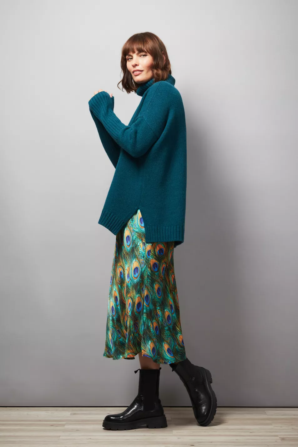 Hope Fashion The Cocoon Roll Neck Jumper Teal; The Peacock Bias Cut Skirt- Peacock Multi