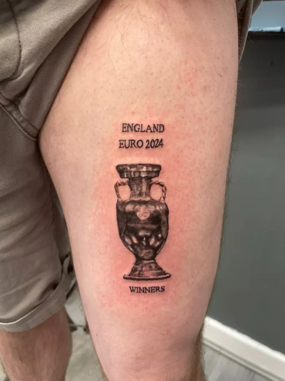 Tattoo of the Euros trophy with the words 'England Euro 2024 Winners'