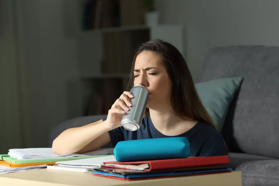 Many people grab an energy drink when they are feeling tired (Alamy/PA)