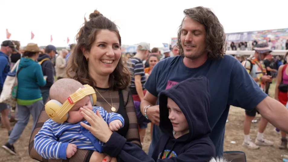 Ten-week-old Finlay (bottom left) with (left to right) his mother Rosie, sister Sofia and father Tom at Glastonbury