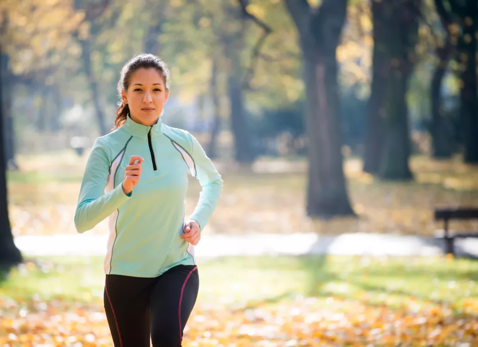 Young woman running in a park