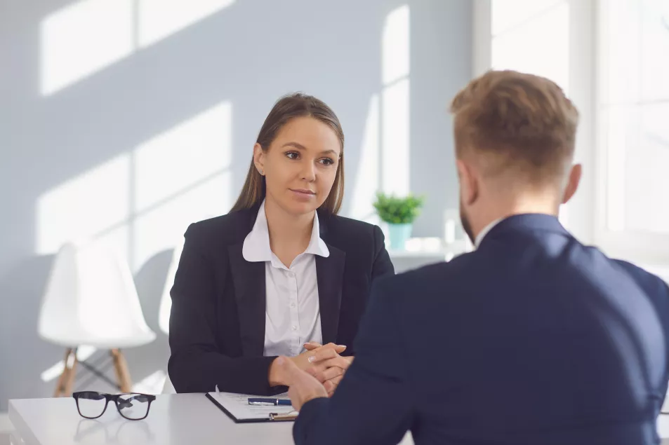 Businesswoman having a serious conversation with her boss 