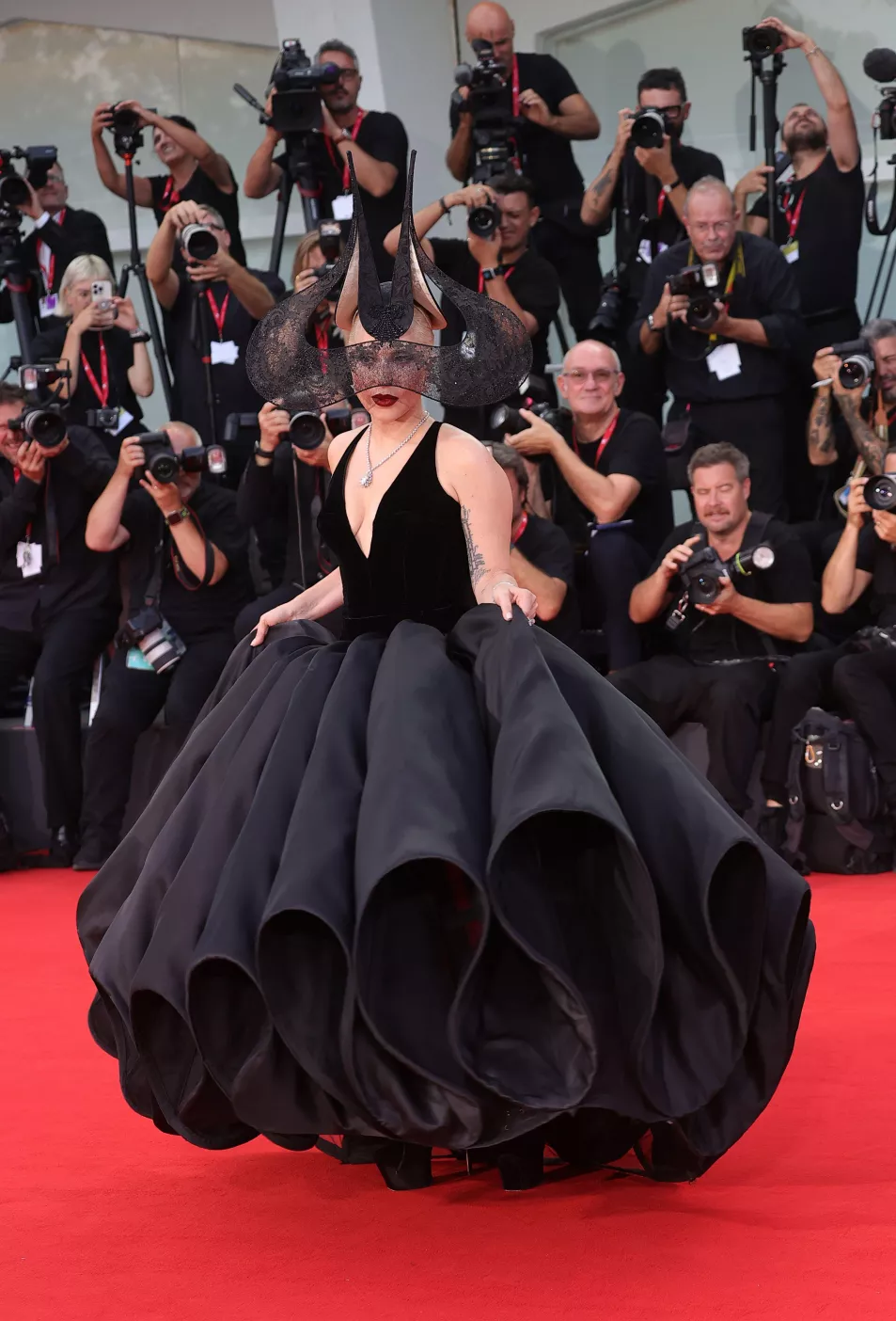 Gaga poses for photographers upon arrival for the premiere of the film ‘Joker: Folie A Deux’ 