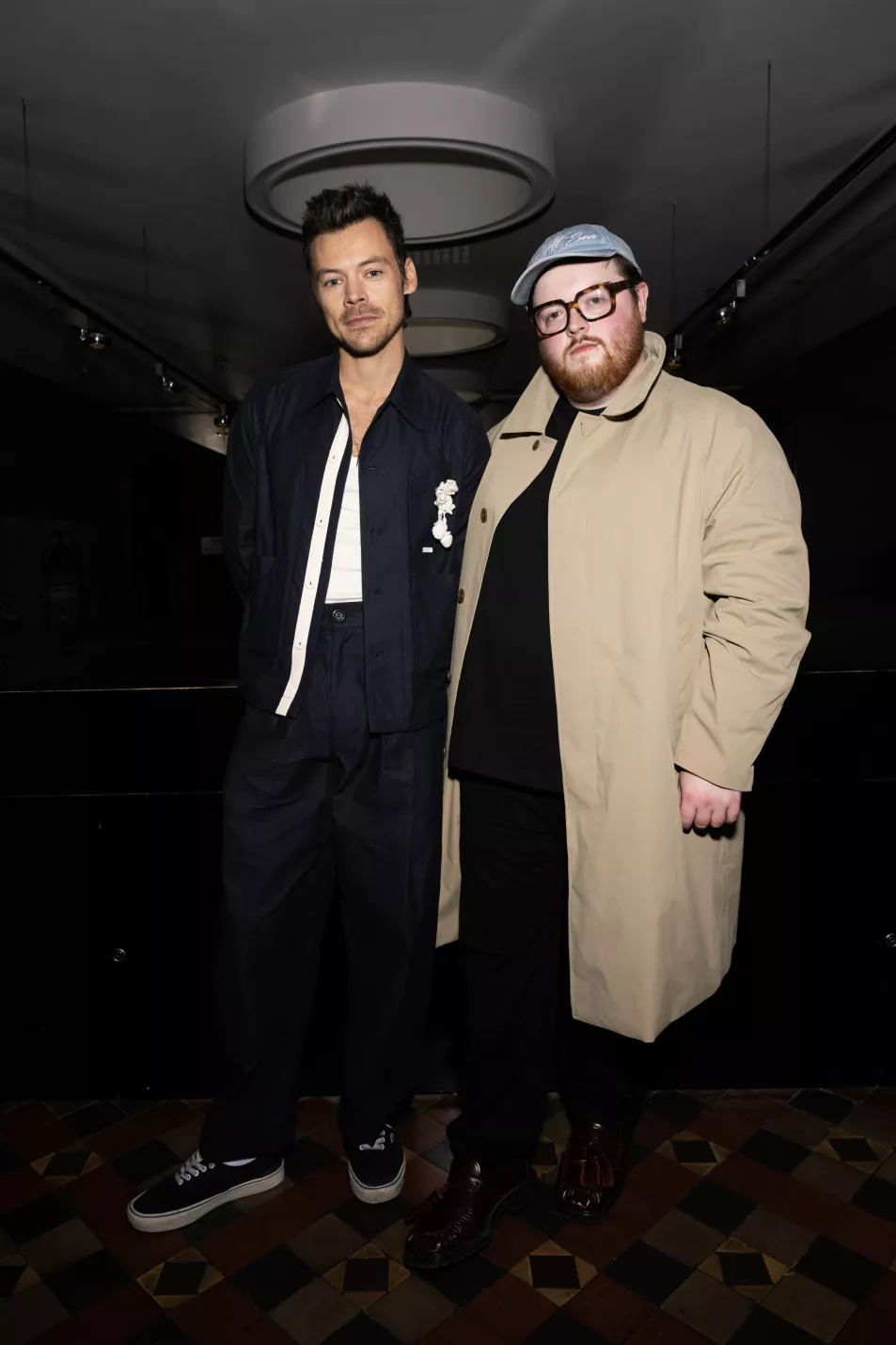 Harry Styles (L) posed with designer Steven Stokey-Daley after the show 