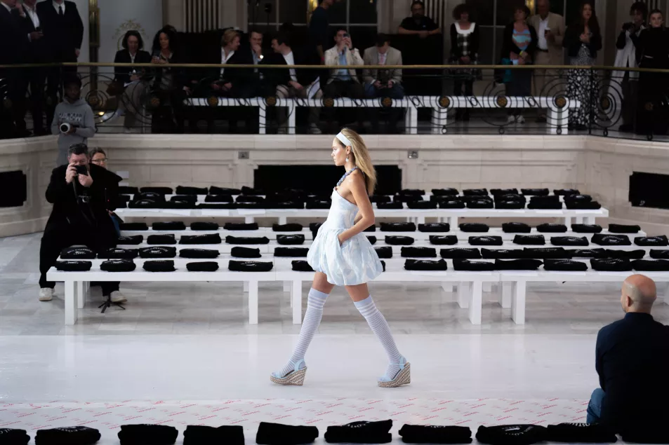 A model practices on the catwalk ahead of the Paul Costelloe show